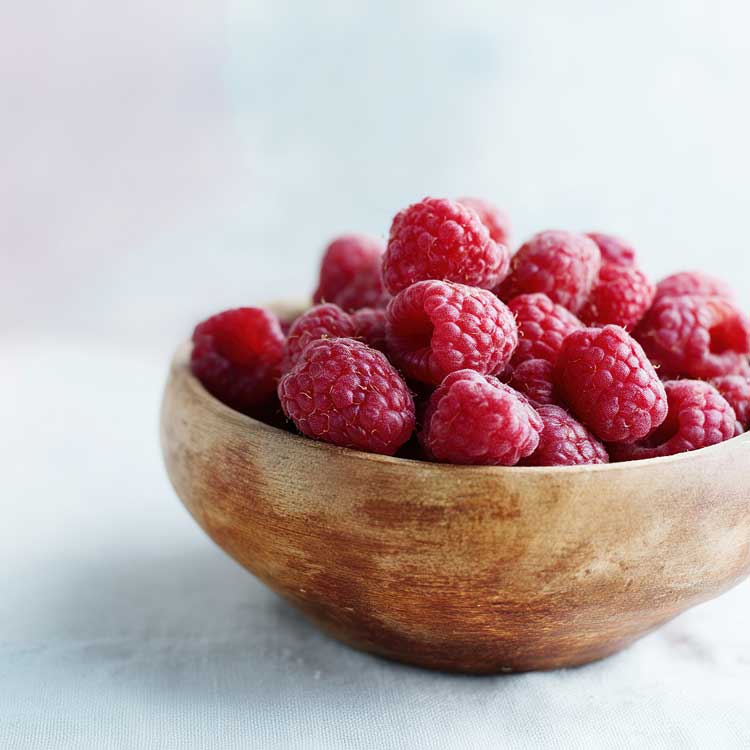 Raspberries In Bowl